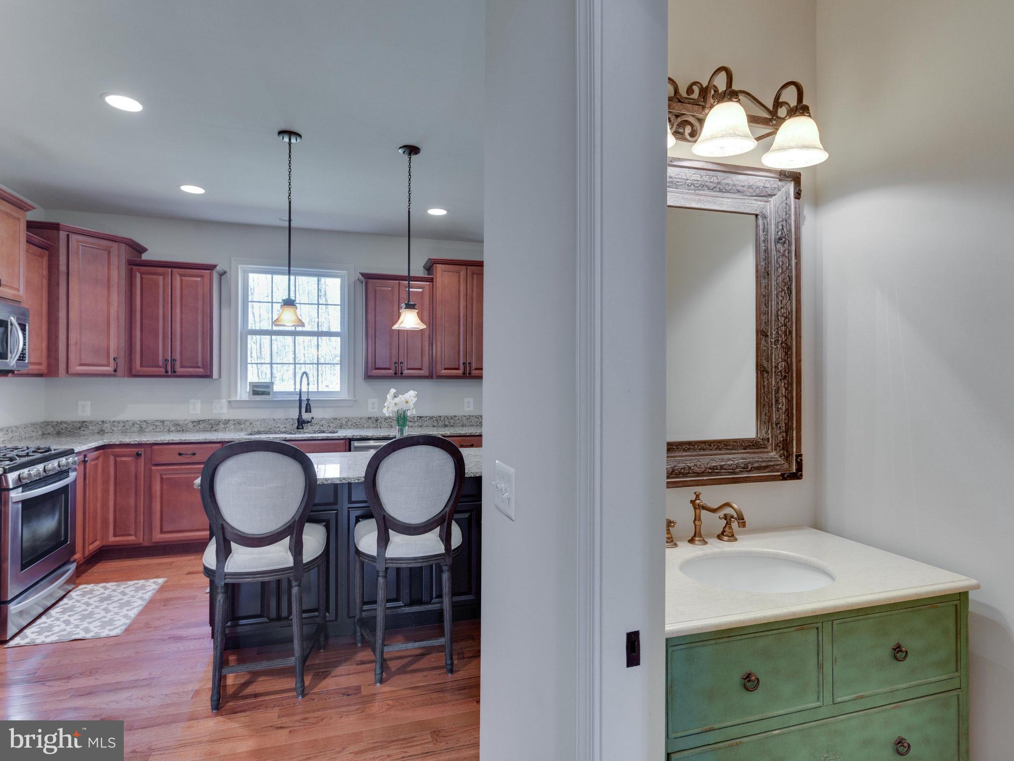 11300 Morgan Ridge Road Nokesville, VA 20181 - Photo 14 of 30 Powder Room located for Formal and Informal Rooms
