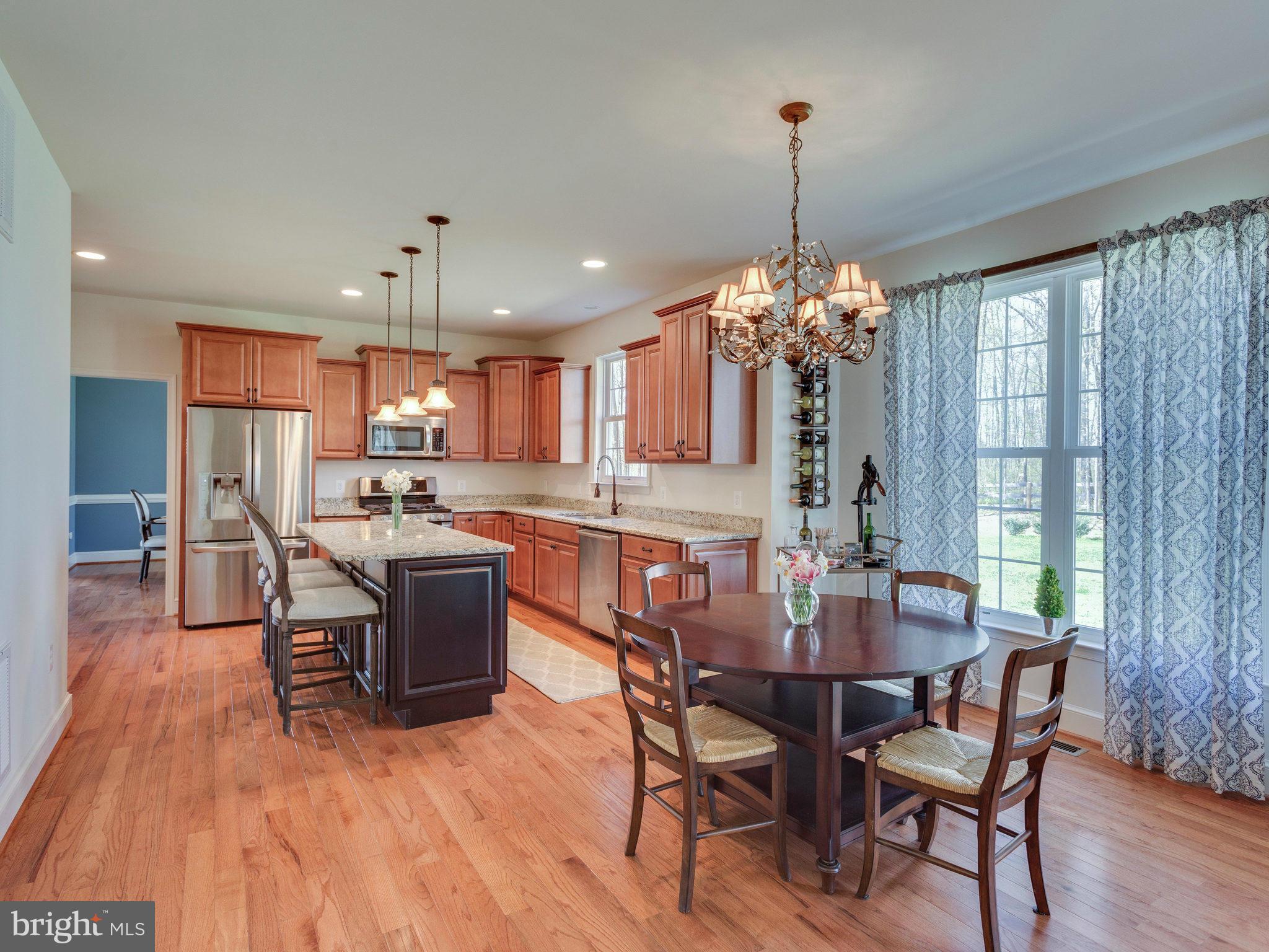 11300 Morgan Ridge Road Nokesville, VA 20181 - Photo 6 of 30 Breakfast Nook open to Kitchen and Family Room