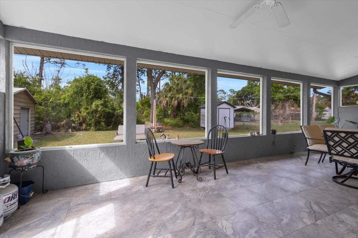 7202 Kenwood Road Fort Pierce, FL 34951 - Photo 18 of 25 Back screened in patio