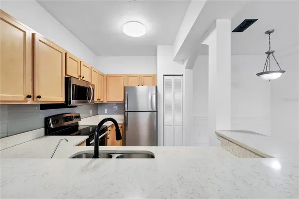 $292,000 | 12855 Madison Pointe Circle, Unit 101, Orlando, FL 32821