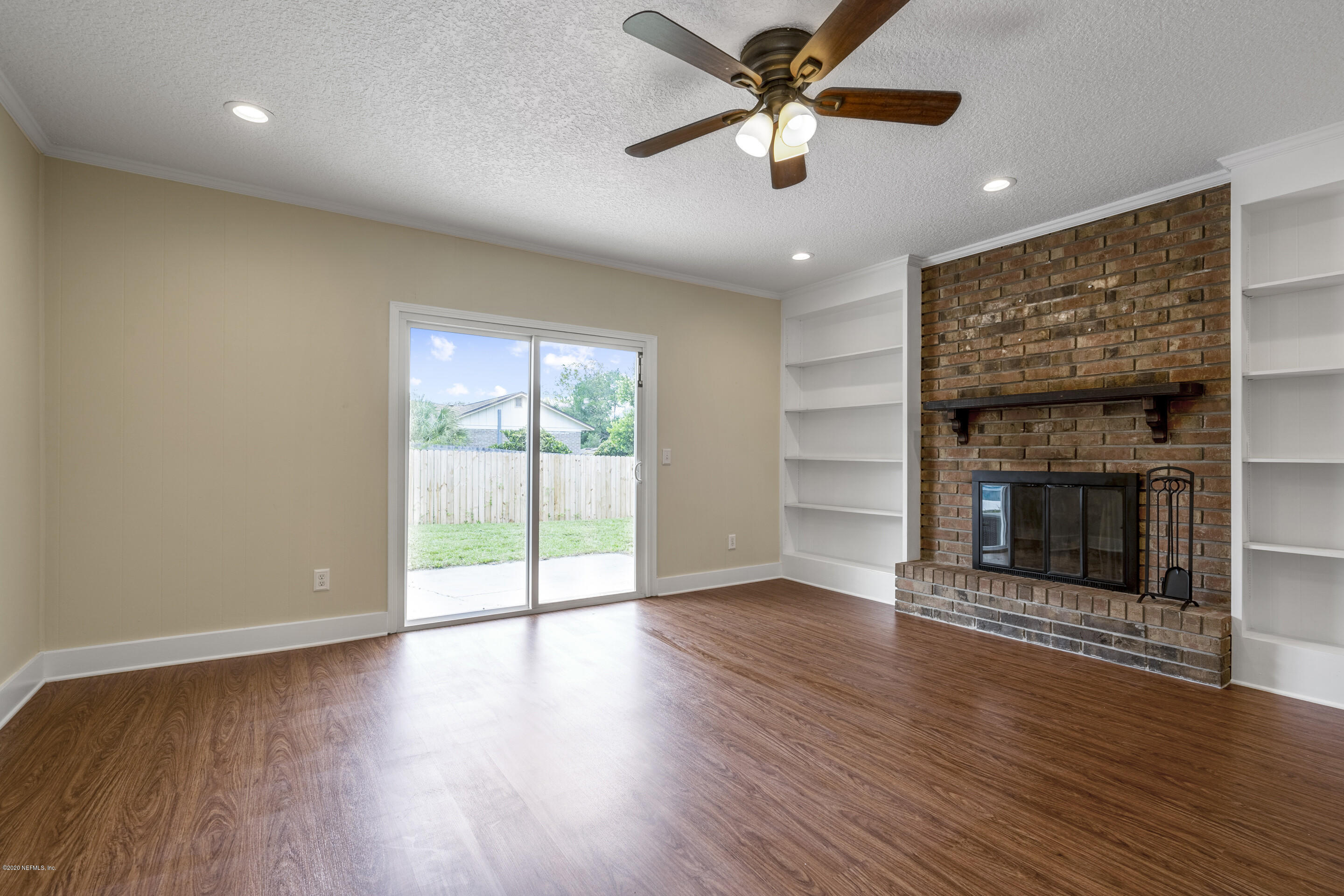 265 Foxridge Road Orange Park, FL 32065 - Photo 6 of 36 Family room with wood burning fireplace