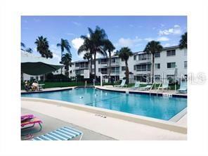 1801 Restful Drive, Unit N7 Bradenton, FL 34207 - Photo 21 of 24 a view of a house with swimming pool