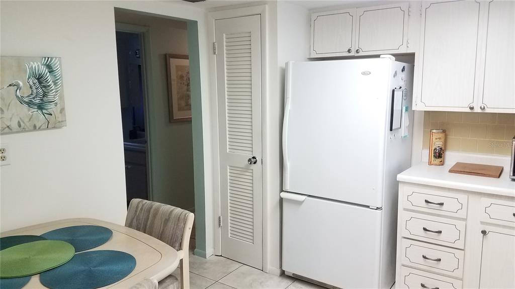 1801 Restful Drive, Unit N7 Bradenton, FL 34207 - Photo 10 of 24 a white refrigerator freezer sitting in a kitchen