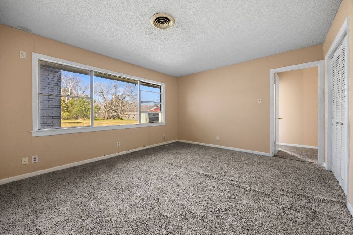 13038 4th Street Santa Fe, TX 77510 - Photo 16 of 39 an empty room with windows