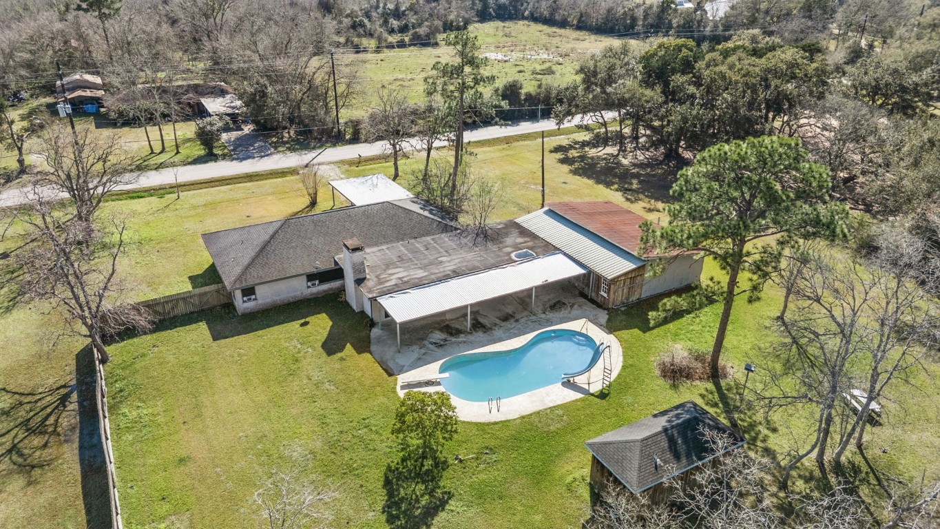 13038 4th Street Santa Fe, TX 77510 - Photo 20 of 39 aerial view of a house with swimming pool