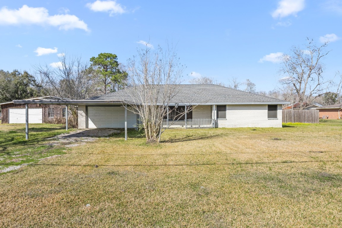 13038 4th Street Santa Fe, TX 77510 - Photo 3 of 39 a house view with swimming pool in front of it