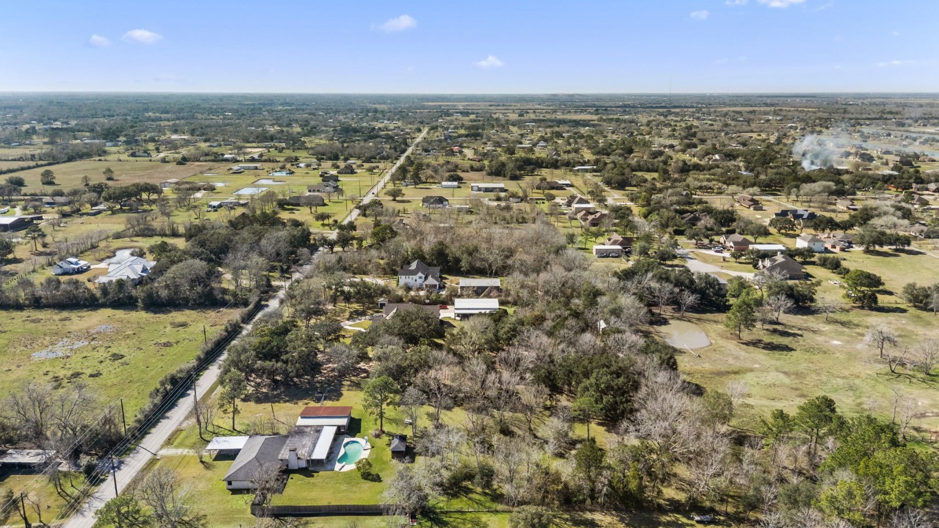 13038 4th Street Santa Fe, TX 77510 - Photo 36 of 39 an aerial view of residential houses with outdoor space