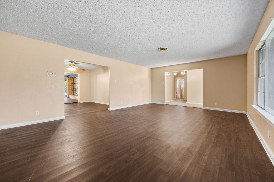 13038 4th Street Santa Fe, TX 77510 - Photo 6 of 39 a view of a livingroom with wooden floor