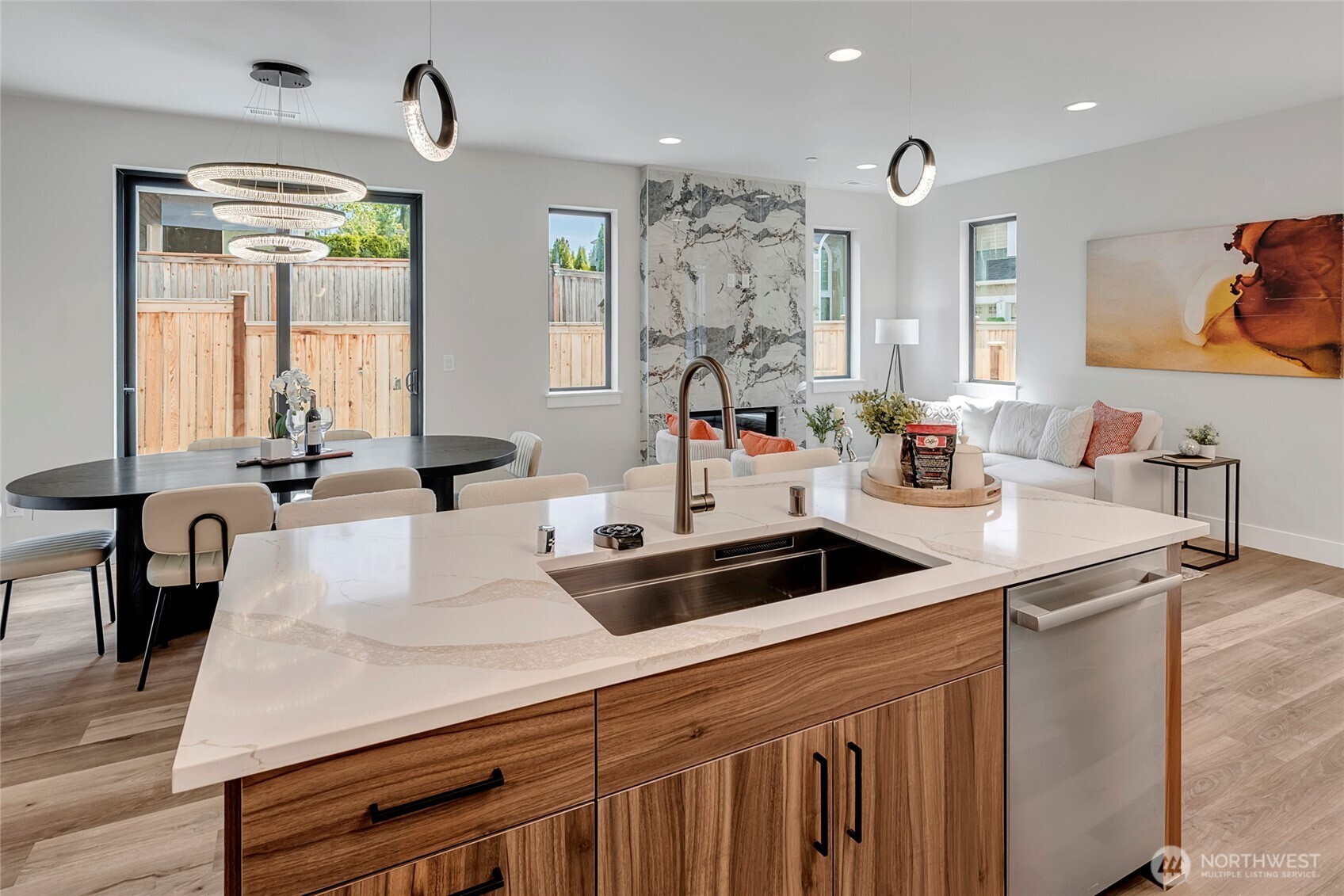3926 214th Place Southeast, Unit B Bothell, WA 98021 - Photo 21 of 30 a kitchen with a sink a stove and chairs
