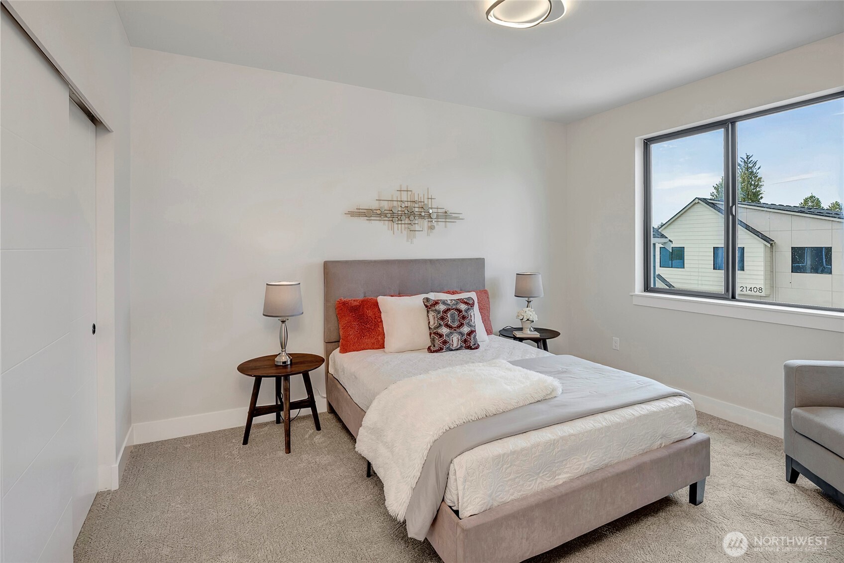 3926 214th Place Southeast, Unit B Bothell, WA 98021 - Photo 23 of 30 a bedroom with a bed and a window