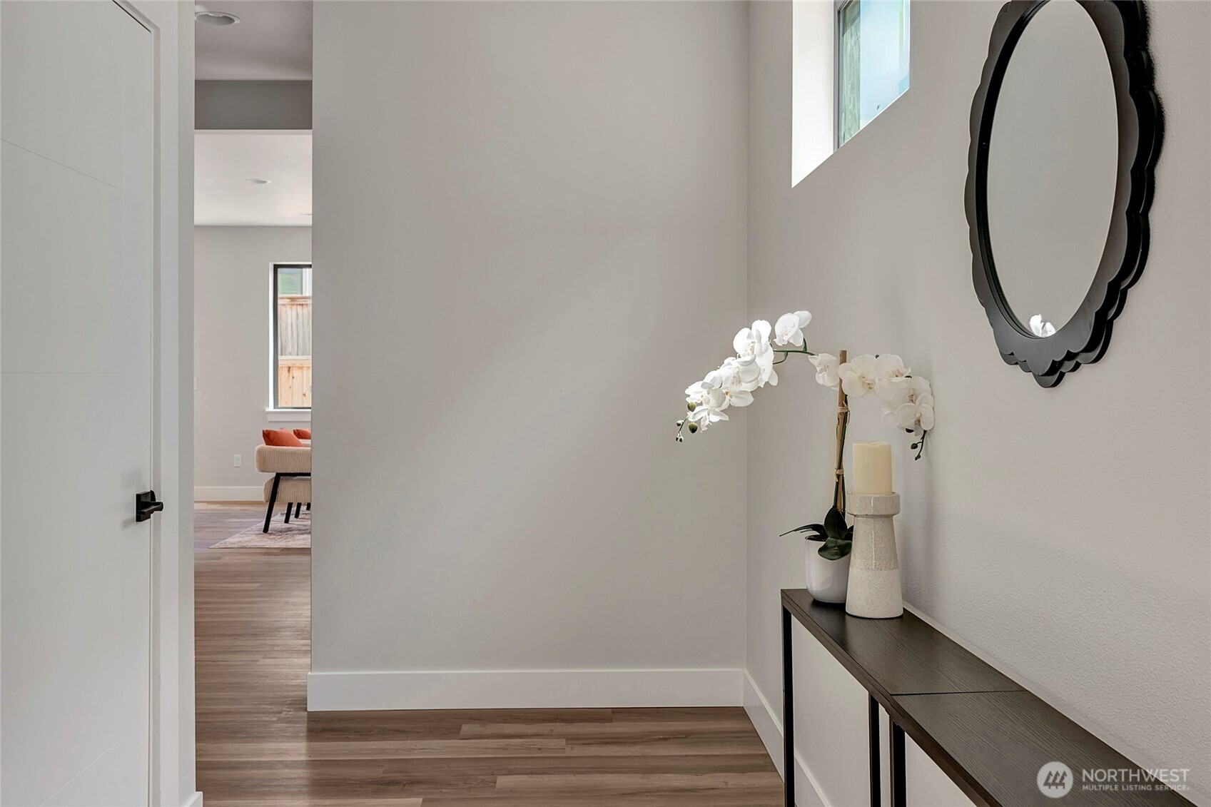 3926 214th Place Southeast, Unit B Bothell, WA 98021 - Photo 27 of 30 a view of a hallway with wooden floor and staircase