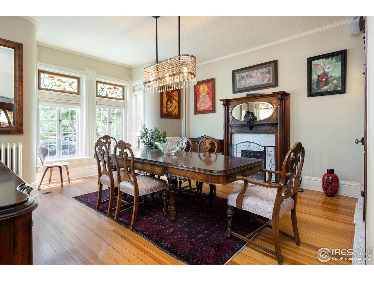 643 Mapleton Avenue Boulder, CO 80304 - Photo 15 of 50 a view of a dining room with furniture window and wooden floor