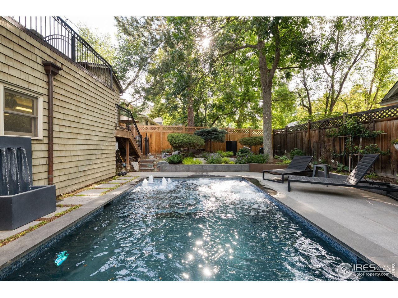 643 Mapleton Avenue Boulder, CO 80304 - Photo 35 of 50 a view of a house with backyard and sitting area
