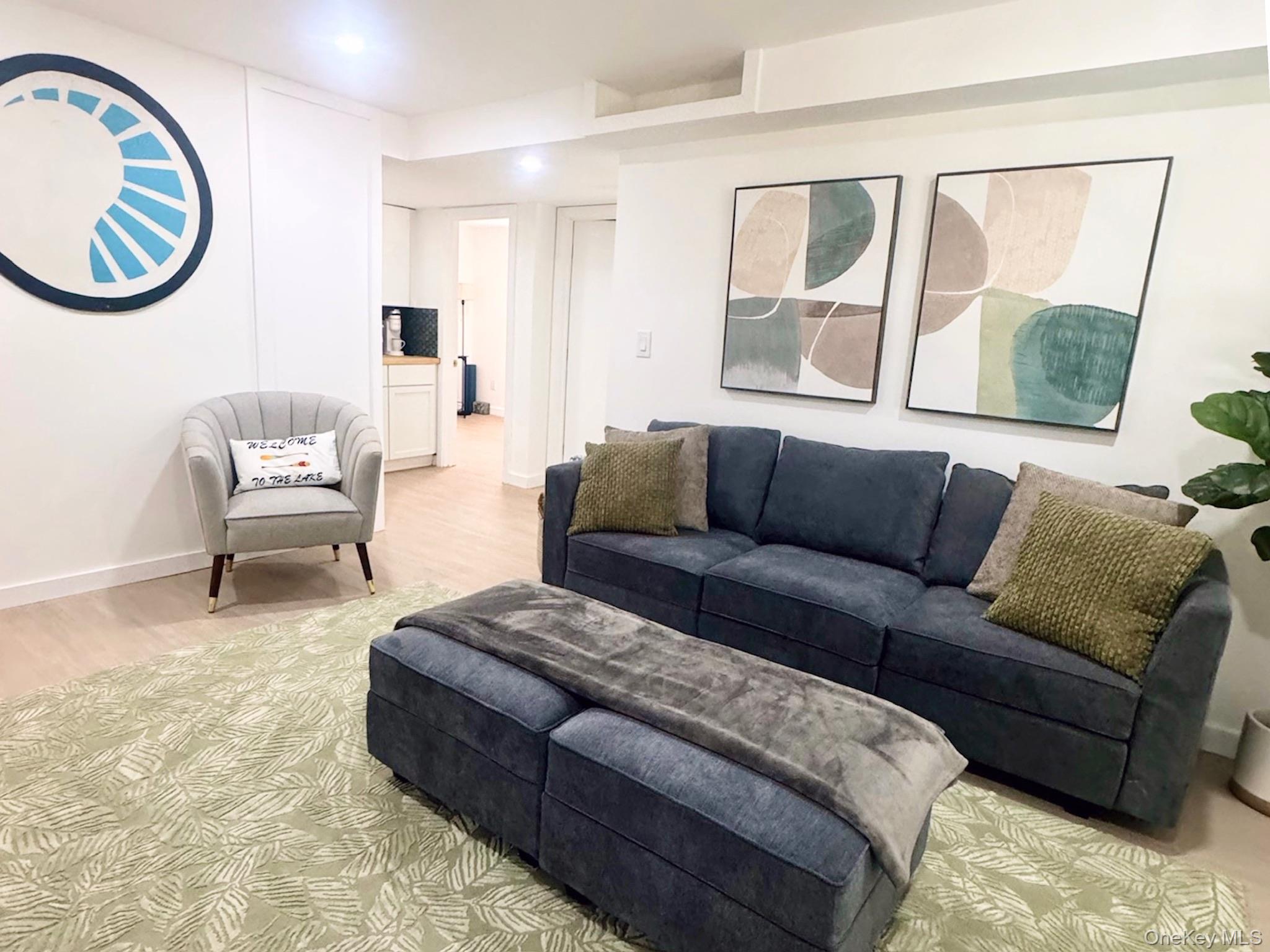 67 West Shore Road Kauneonga Lake, NY 12749 - Photo 9 of 17 Living area featuring wood finished floors and recessed lighting