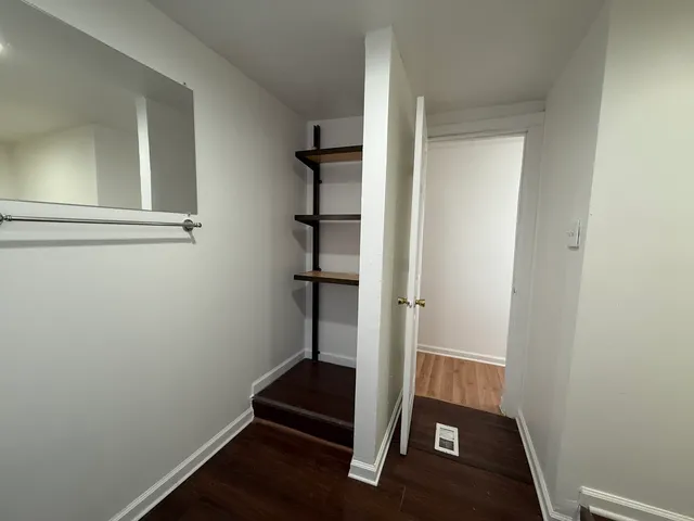 a bathroom with a toilet and a sink