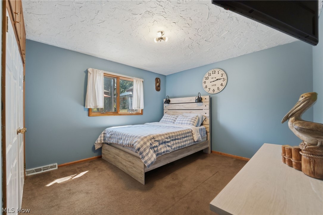 8965 Cedar Road Chesterland, OH 44026 - Photo 27 of 50 Additional 3 Bedrooms are Separate from the Primary Suite