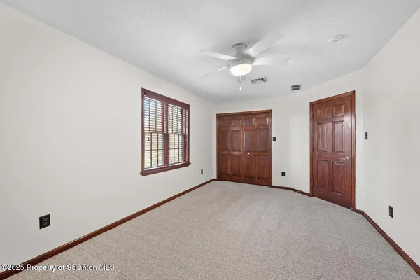 a bathroom with a sink a vanity and a mirror