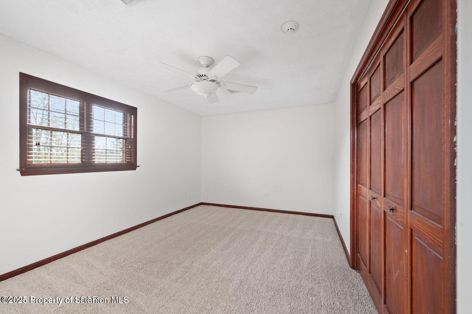 1266 Ryman Road Dallas, PA 18612 - Photo 20 of 73 a view of an empty room with a window