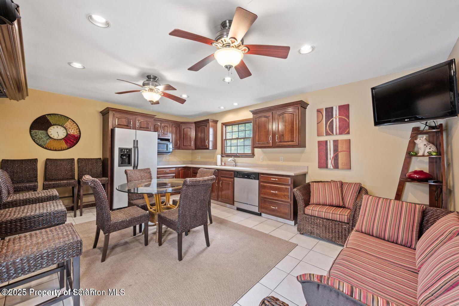 1266 Ryman Road Dallas, PA 18612 - Photo 69 of 73 a living room with furniture and a flat screen tv