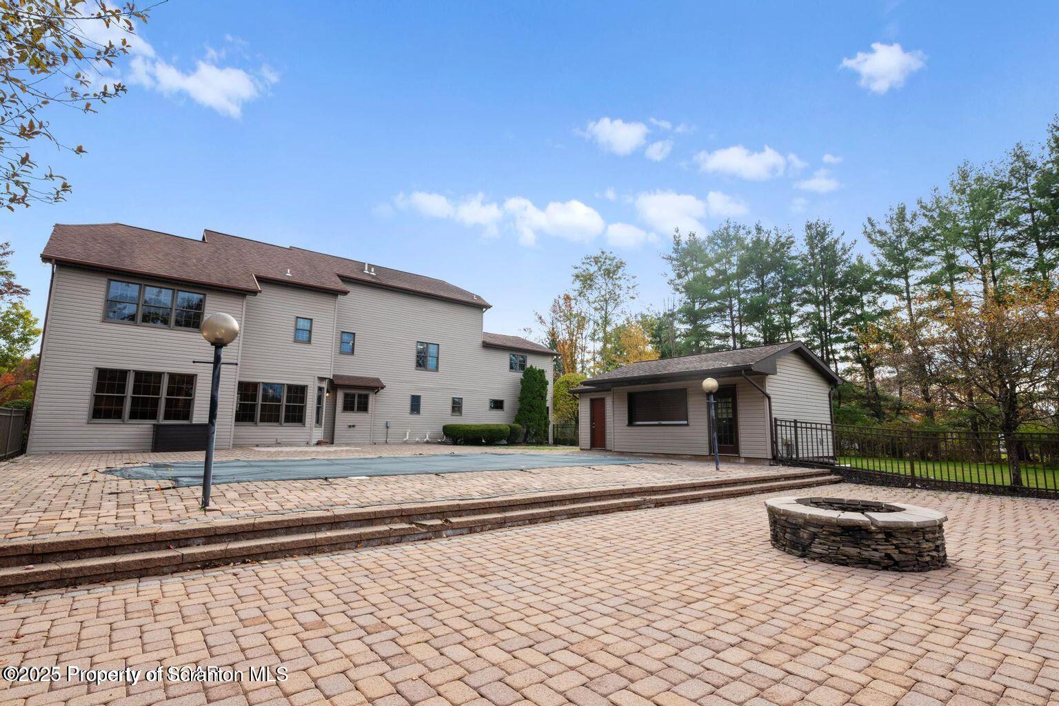 1266 Ryman Road Dallas, PA 18612 - Photo 73 of 73 a front view of a house with a yard