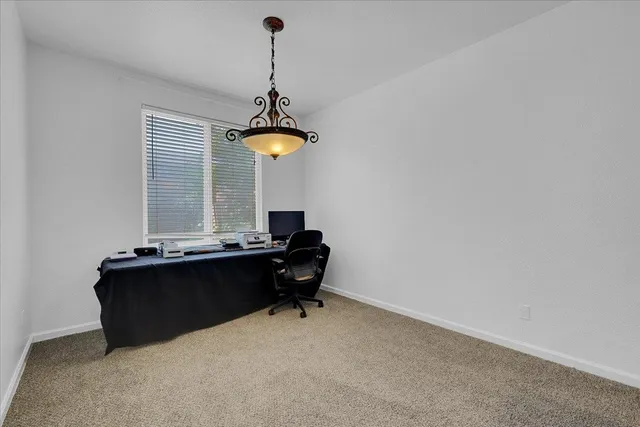 a room with a table and a window