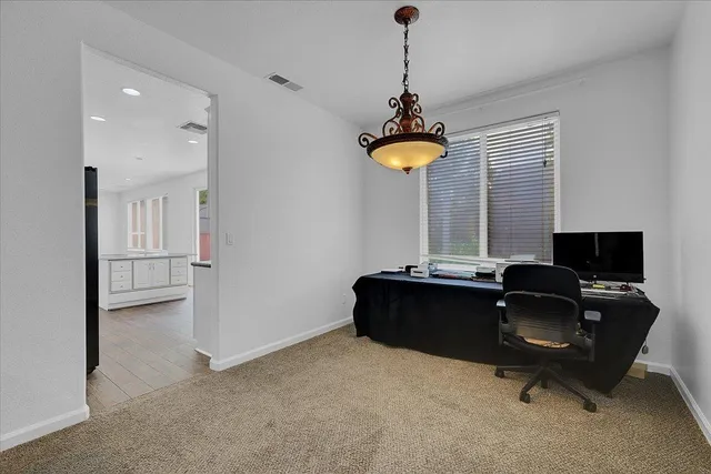 a living room with a couch and a table