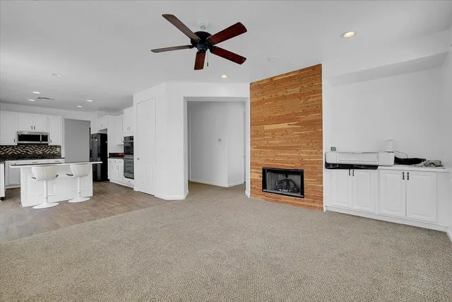 a view of a livingroom with a fireplace