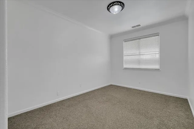 a view of a workspace with furniture