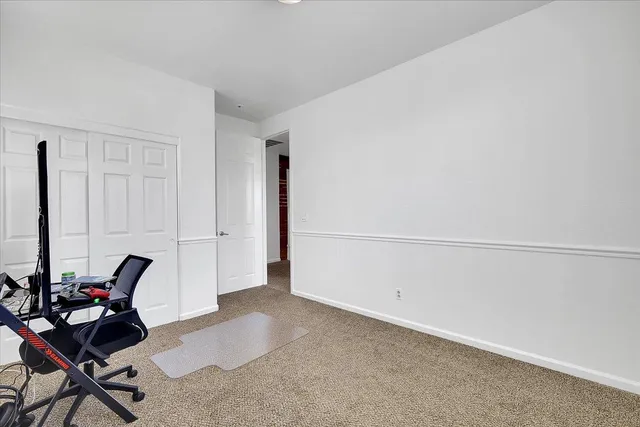 a view of a backyard with pathway