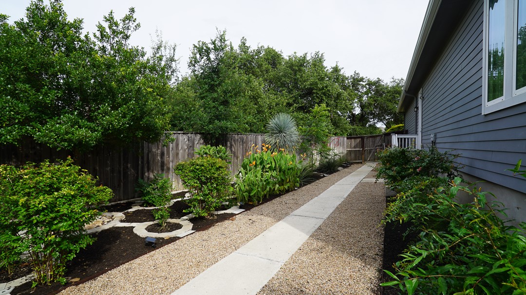 629 Germander Road Leander, TX 78641 - Photo 30 of 38 a view of a garden with pathway