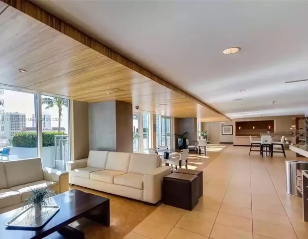 a view of a kitchen with furniture