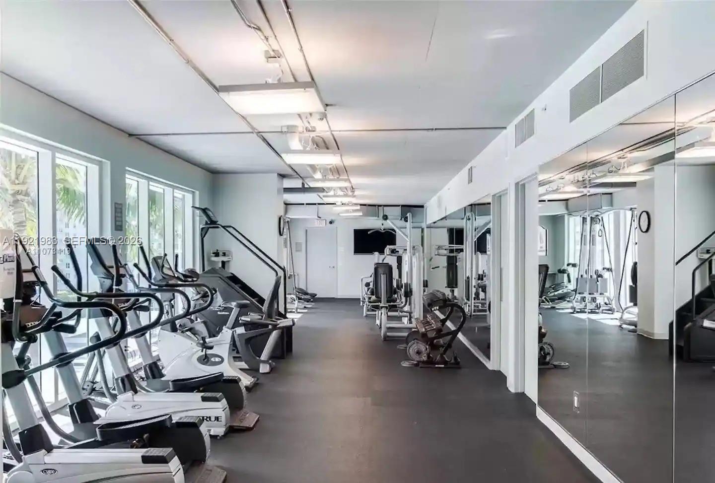60 Southwest 13th Street, Unit 4414 Miami, FL 33130 - Photo 21 of 21 a view of a room with gym equipment