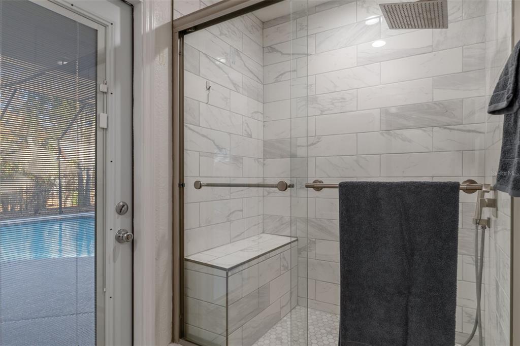 10918 Midland Bridge Road Hudson, FL 34667 - Photo 38 of 42 a bathroom with a shower and a sink