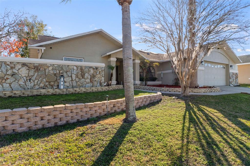 10918 Midland Bridge Road Hudson, FL 34667 - Photo 4 of 42 a view of a house with backyard and sitting area