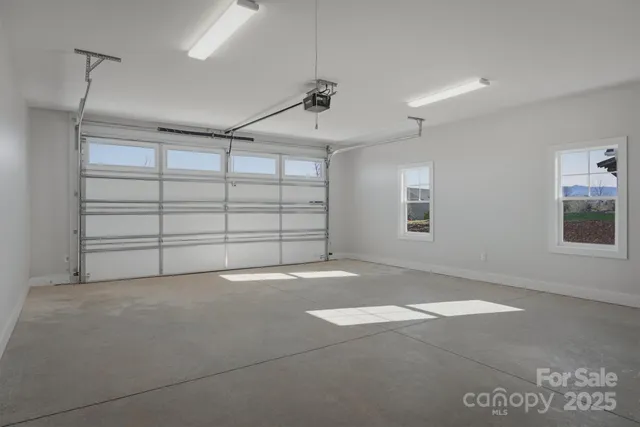 a view of a house with furniture and garden