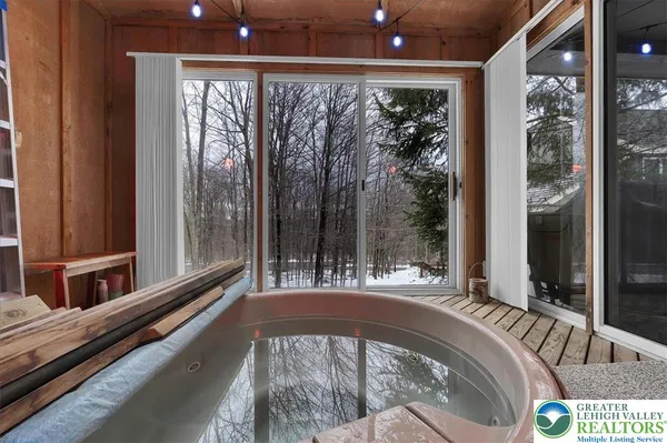 a view of swimming pool from a balcony