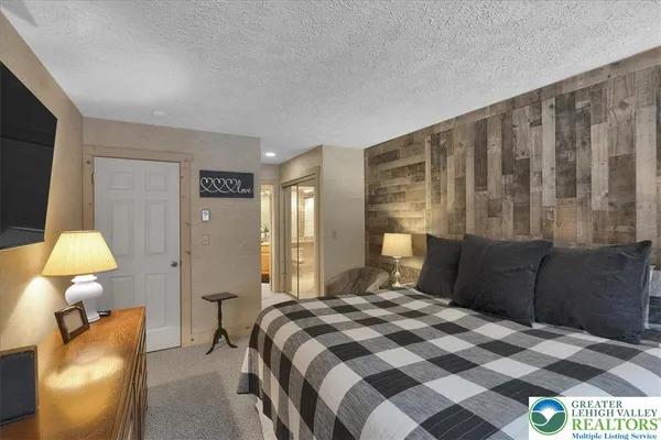 a bathroom with a sink and a large mirror