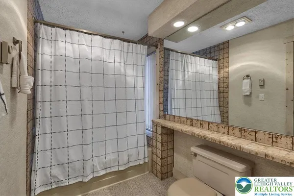 a view of a hallway with front door