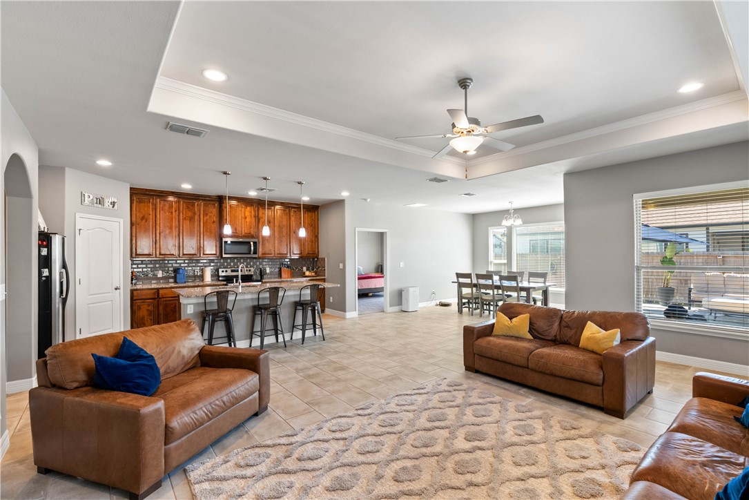 1815 Monterey Bay Drive Portland, TX 78374 - Photo 12 of 38 a living room with furniture and a large window
