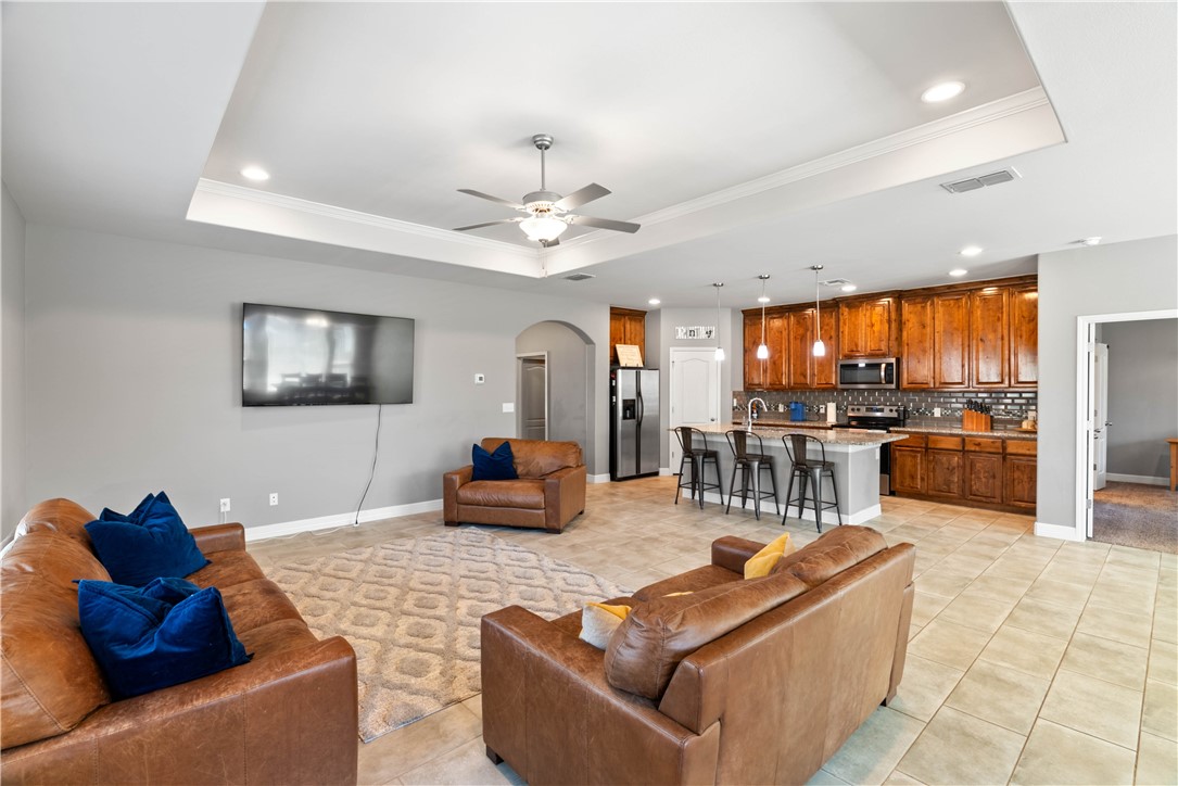 1815 Monterey Bay Drive Portland, TX 78374 - Photo 13 of 38 a living room with furniture and kitchen view