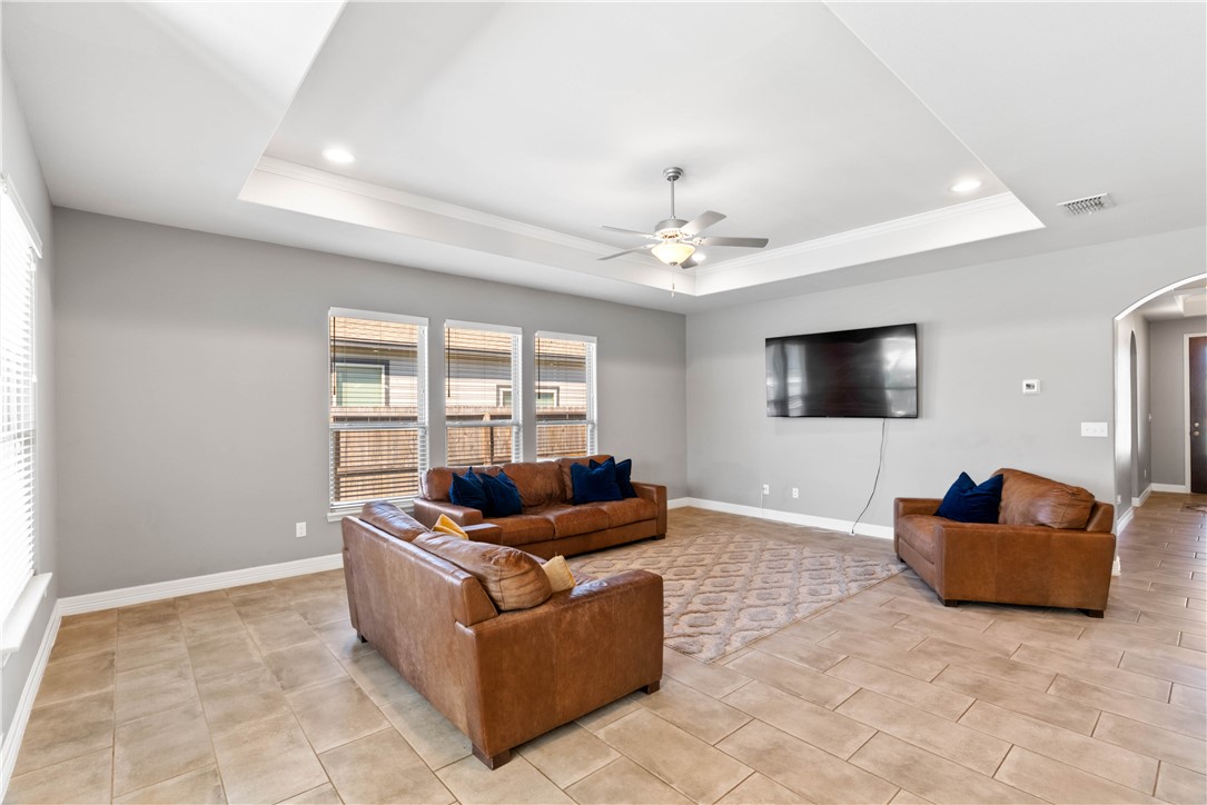 1815 Monterey Bay Drive Portland, TX 78374 - Photo 14 of 38 a living room with furniture and a flat screen tv