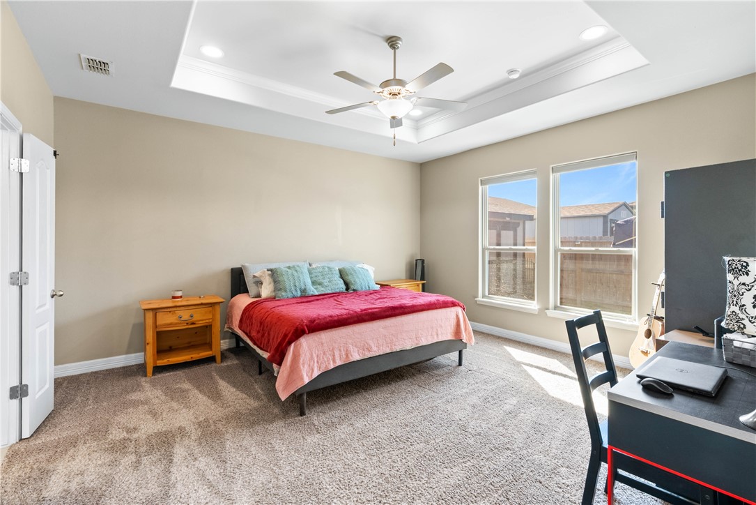 1815 Monterey Bay Drive Portland, TX 78374 - Photo 16 of 38 a bedroom with a bed and a window