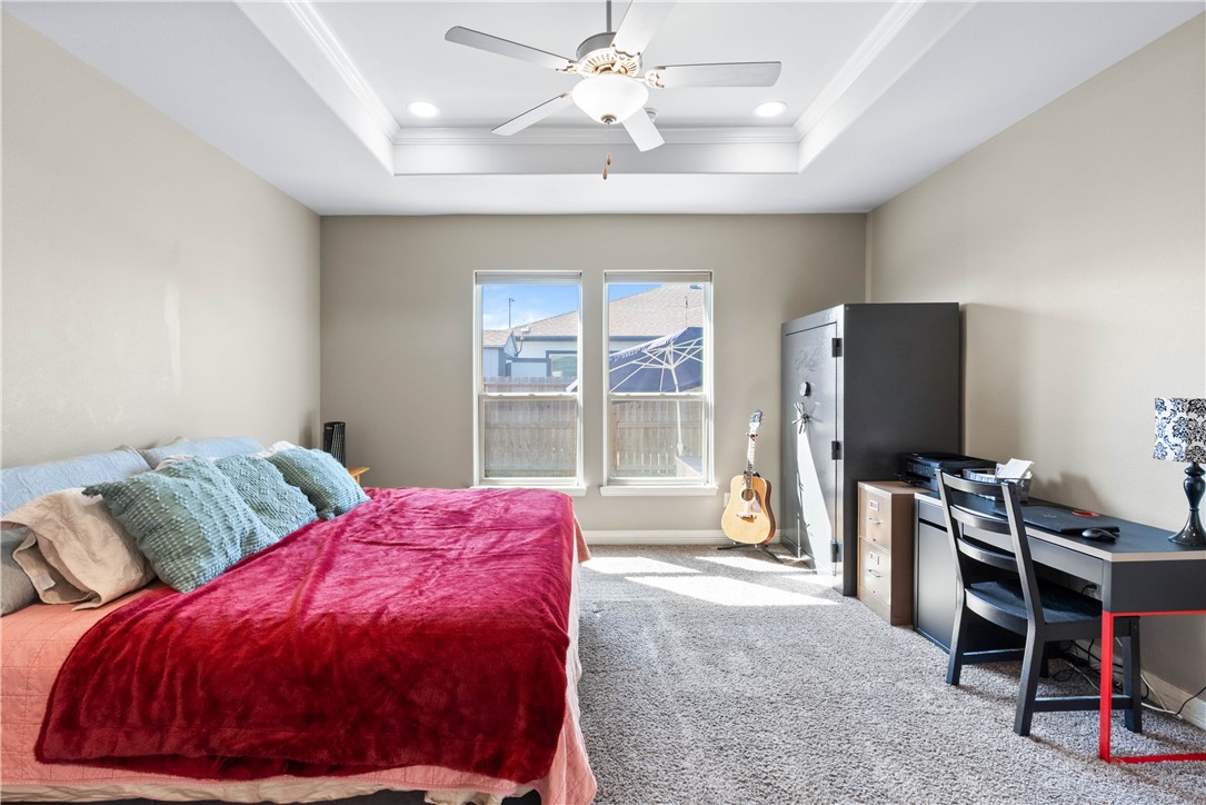 1815 Monterey Bay Drive Portland, TX 78374 - Photo 18 of 38 a bedroom with a bed and a desk