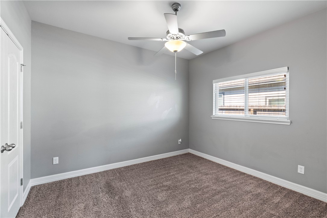 1815 Monterey Bay Drive Portland, TX 78374 - Photo 25 of 38 wooden floor in an empty room with a window