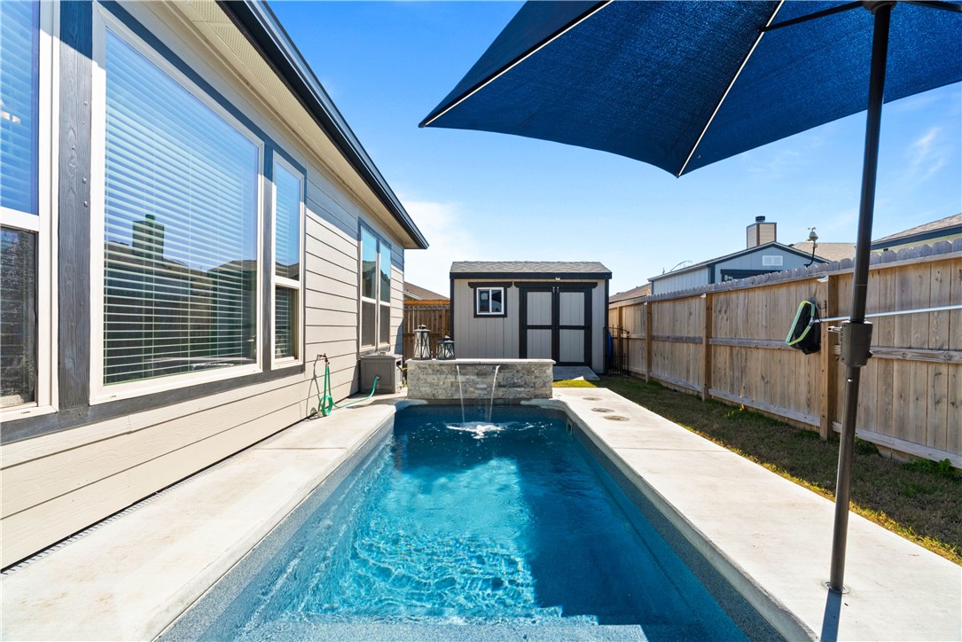 1815 Monterey Bay Drive Portland, TX 78374 - Photo 30 of 38 a view of house with a swimming pool