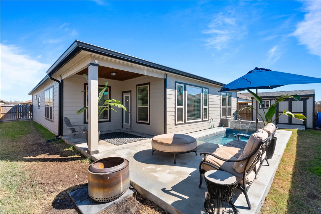 1815 Monterey Bay Drive Portland, TX 78374 - Photo 31 of 38 a view of a house with backyard and sitting area