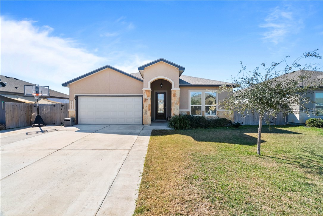 1815 Monterey Bay Drive Portland, TX 78374 - Photo 4 of 38 a front view of a house with garden