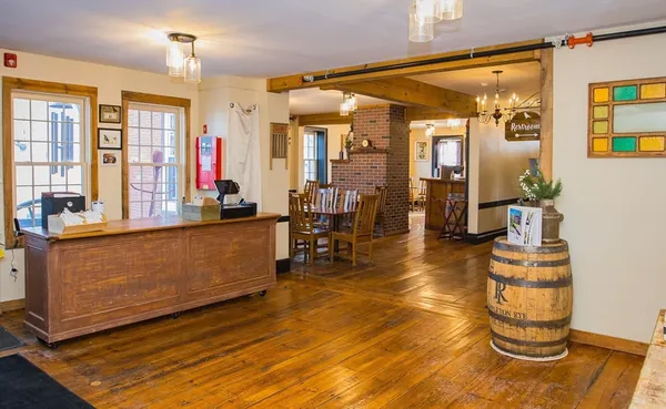 a room with lots of counter and glass door