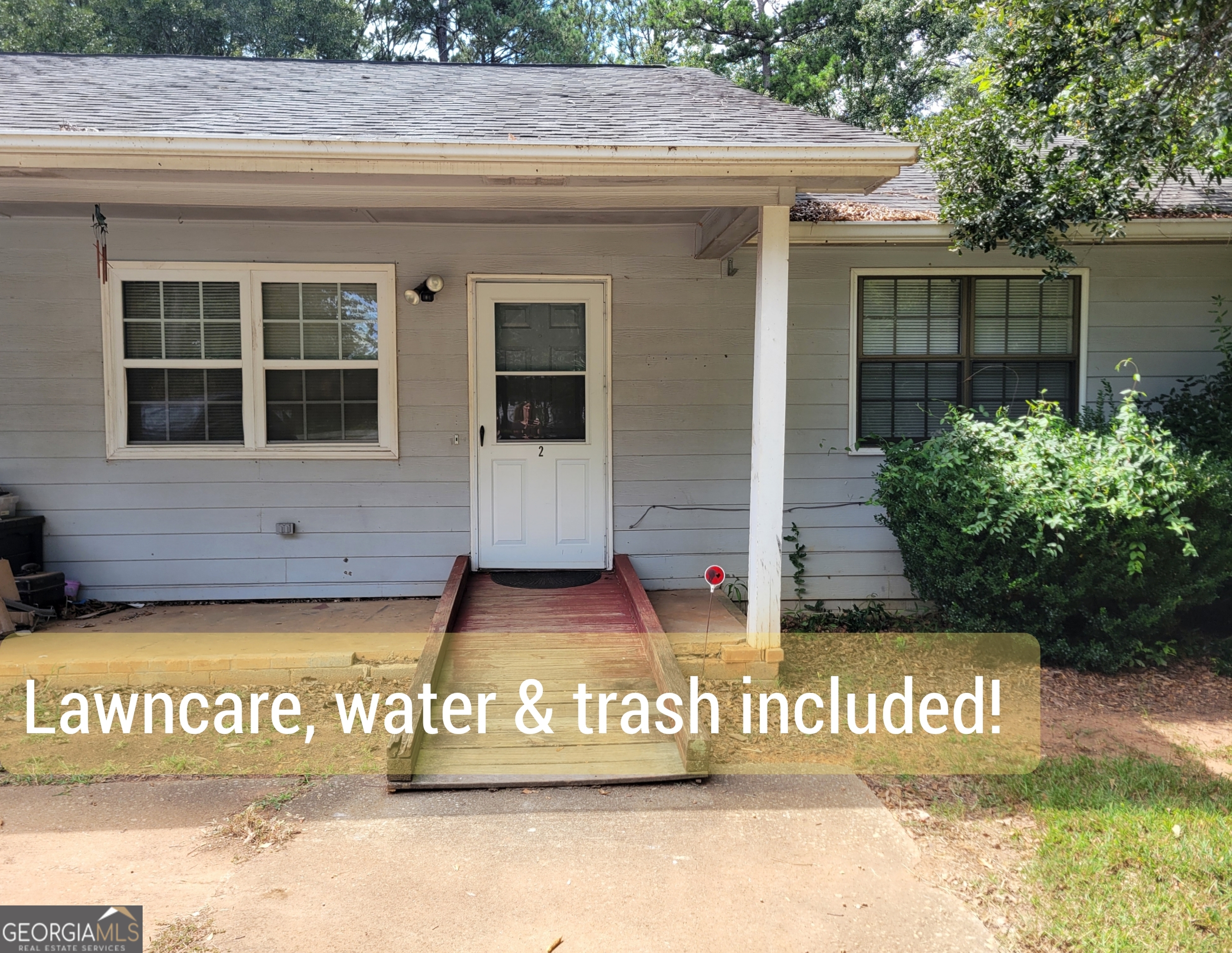 8 Candlewood Terrace Northeast, Unit 2 Winder, GA 30680 - Photo 1 of 8 a front view of a building