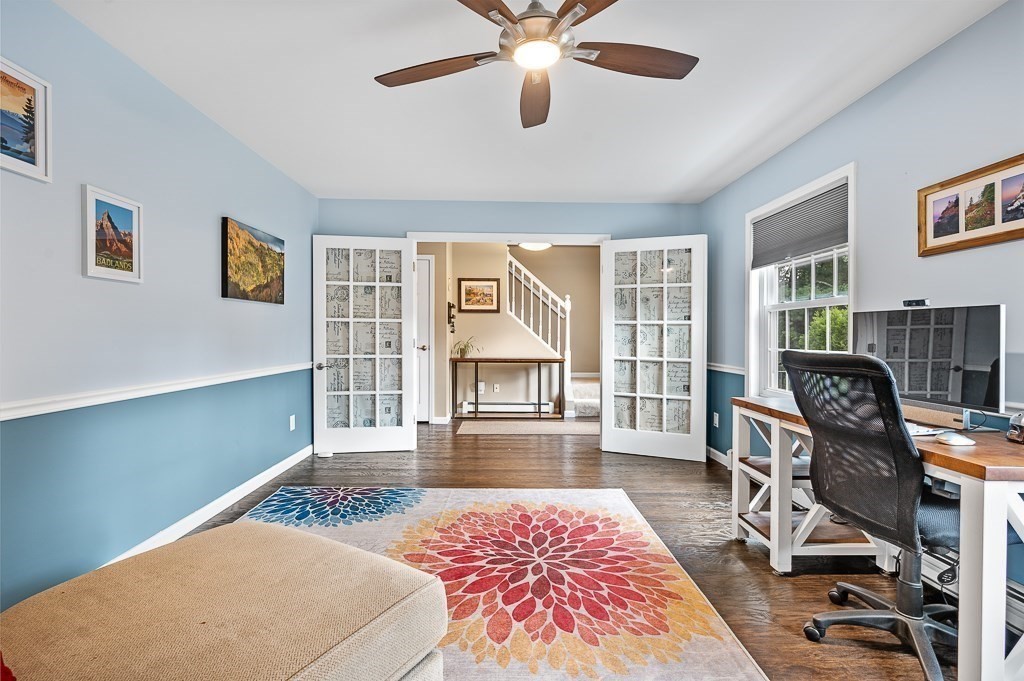 6 Edward Road Dudley, MA 01571 - Photo 11 of 28 a bedroom with furniture and a wooden floor